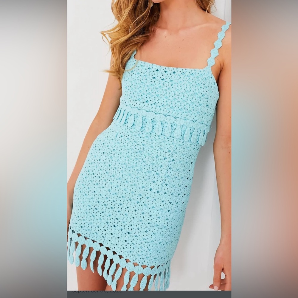 AI Overview


This image shows a Saylor Caitriona Mini Dress  worn 1 time!!!